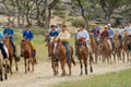 Local boys take part in horse riding competition as part of a traditional wedding ceremony circa Harhorin, Mongolia.