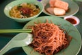 Local breakfast: fried bee hoon, noodle soup, and fried snacks on table