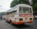 A local bus running on street in Kolkata, India Royalty Free Stock Photo