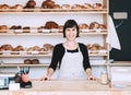 Local business owner or bakery worker behind the counter Royalty Free Stock Photo