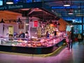 Local butcher counters and their customers in the new Market Hall in Preston, Lancashire, UK