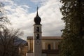 Local church in Povo suburb of Trento Italy with clouds on bac