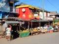Local colorful shops with fruit, balconies, village Madagascar, Africa