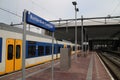 Local commuter type sprinter waiting on Rotterdam Central Station at platform to leave to Gouda