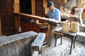 A local craftsman makes wooden pots near Marrakech, Morocco.