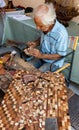 Local craftsman working in his outdoor workshop
