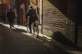 Local cyclist in the alleys of old city in Marrakesh, in Morocco. December 13 2018 .