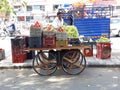 Local dealer selling a sale in Lari on footpath in the summer