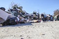 Local dump overflowing from Christmas trash and waste ground view