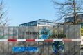 Local European School Europaschule closed due to global corona virus, COVID-19 pandemic. Logo with barrier tape.