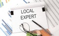 LOCAL EXPERT , text on the chart , office supplies, business concept