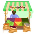 A local farmer sells fresh vegetables at a stall at the local food market