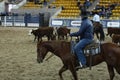 local farmers riding their quaterhorses