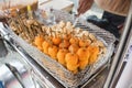 Local Filipino street food with bamboo skewers - Kikiam, Fishballs, Squid balls, and Kwek Kwek Quail Eggs