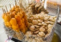 Local Filipino street food with bamboo skewers - Kwek Kwek Quail Eggs, Fishballs, Squid balls, and Kikiam