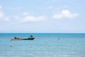 Local Fisherman Boats on the left side floating over the sea with bright sky in background in the afternoon at Koh Mak Island. Royalty Free Stock Photo
