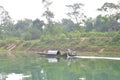 Local fisherman are fishing with his small boat on the Trang An river Royalty Free Stock Photo