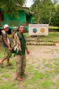 Local fisherman standing with fish by visitor center on Rinca Is