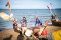 Local fishermen help unpack fish from nets at the local fishing pier, Jomtien Beach, Pattaya