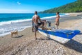 Local fishermen on Playa San Rafael, Barahona, Dominican Republic preparing their boat for fishing