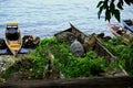 Abandoned local fisherman boat with traps in Toba Lake, North Sumatra, Indonesia. Royalty Free Stock Photo