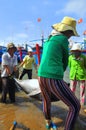 Local fishermen are transporting tuna fish from their vessels to the stretcher and bring it to the testing house in Tuy Hoa