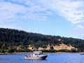 A local fishermen trolling for salmon in his small fishing vessel off the coast of British Columbia