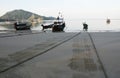 Local fishing boats on the beach in the morning Royalty Free Stock Photo