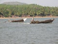 Fishing boats lined along the shore. India, Karnataka Royalty Free Stock Photo