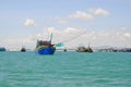 Local fishing boats are mooring in the Lagi beach Royalty Free Stock Photo