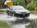 Local Flood - Vehicle Driving Through Water