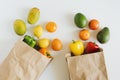 Local fruits and vegetables delivered in brown eco friendly paper bags