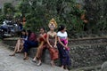 A  local girl with an ornate gold head-dress waits for the  annual Perang Pandan festival to Royalty Free Stock Photo