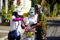 Local government workers distribute relief goods during the Covid 19 virus outbreak