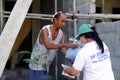Local government workers distribute relief goods during the Covid 19 virus outbreak