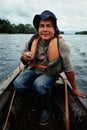 Local guide on the river in a canoe