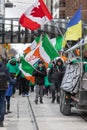 Local labour unions marching with flags in the annual St Patrick\'s Day parade on Queen Street