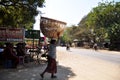Local life lifestyle of burmese people with foreign travelers and burma monks beside street road at UNESCO World Heritage Site at