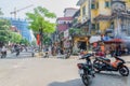 Local daily life and view of busy traffic with motorbikes in Hanoi Old Quarter, capital of Vietnam.People can seen exploring it. Royalty Free Stock Photo