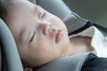 Local lifestyle Asian Chinese baby boy on child safety car seat Royalty Free Stock Photo