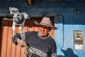 Local man with an eagle in the Colca Canyon, Peru