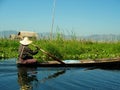 Local man paddling in the Inle Lake, Myanmar