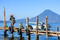 Local man & San Pedro volcano, Lake Atitlan, Guatemala Royalty Free Stock Photo
