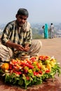 Local man selling food outside Buland Darwasa Victory Gate lea