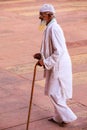 Local man walking in the courtyard of Jama Masjid in Fatehpur Si