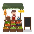 Local market farmer selling vegetables produce. Royalty Free Stock Photo