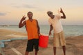 Local men having party at Boca Chica beach Royalty Free Stock Photo