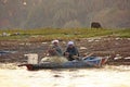 Local men paddling boat on the Nile river, Luxor