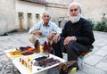 Local men selling beads and perfume at the entrance to Abrahams Pool in Urfa in Turkey.