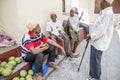 Local men talking and selling. Stone Town, Zanzibar. Tanzania Royalty Free Stock Photo